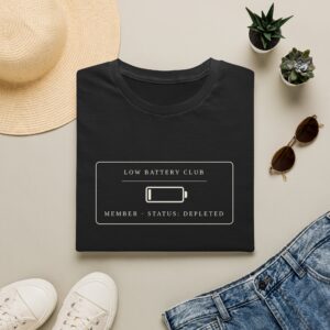 Membership Card tee by Low Battery Club — storm blue shirt with cream battery-gauge badge print — product photo 1