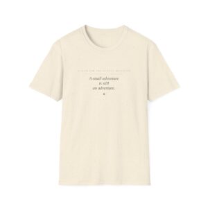 The Motto tee by Low Battery Club — cream shirt with ink “A small adventure is still an adventure” print — product photo 1